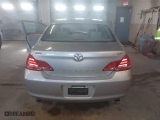2005 Toyota Avalon XL with VIN 4T1BK36BX5U045813, listed as a IAAI auction lot 42061631 with 150,436 mi miles. Bid and sale history available at carsss.com. Image 16.