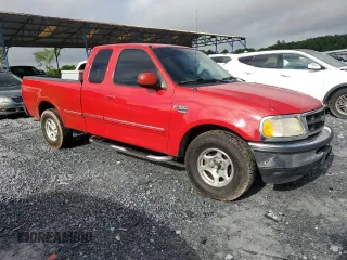 1998 Ford F-150 z VIN 1FTZX17W8WNC34501, wystawiony jako Copart lot #54675995 z przebiegiem 124 628 mil mil oraz Szkoda całkowita • Salvage title. Historia ofert i sprzedaży dostępna na DreamBid. Obrazek 4.