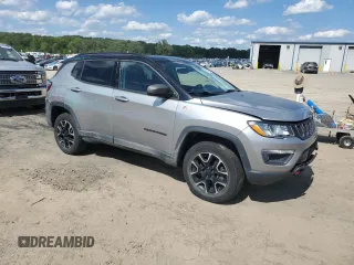 2021 Jeep Compass Trailhawk with VIN 3C4NJDDB5MT571837, listed as a Copart auction lot 58865625 with 75,456 mi miles and Salvage title. Bid and sale history available at DreamBid. Image 4.
