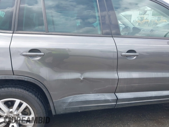 2012 Volkswagen Tiguan SEL with VIN WVGAV7AX8CW005146, listed as a IAAI auction lot 42126959 with 134,005 mi miles and . Bid and sale history available at DreamBid. Image 6.