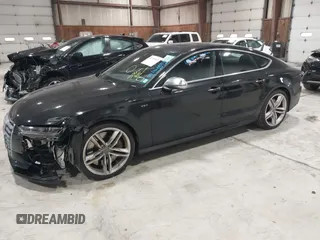 2016 Audi S7 with VIN WAUW2AFC5GN010917, listed as a IAAI auction lot 41785569 with 33,761 mi miles. Bid and sale history available at carsss.com. Image 2.