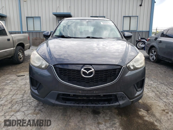 2014 Mazda CX-5 Sport with VIN JM3KE2BE9E0372370, listed as a Copart auction lot 58980165 with 175,477 mi miles and Salvage title. Bid and sale history available at DreamBid. Image 5.