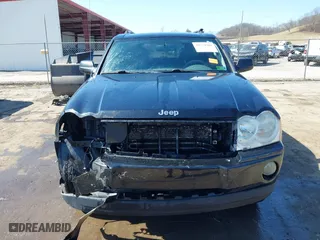 2007 Jeep Grand Cherokee Laredo with VIN 1J8GR48K67C523705, listed as a IAAI auction lot 41774281 with 215,572 mi miles. Bid and sale history available at carsss.com. Image 13.