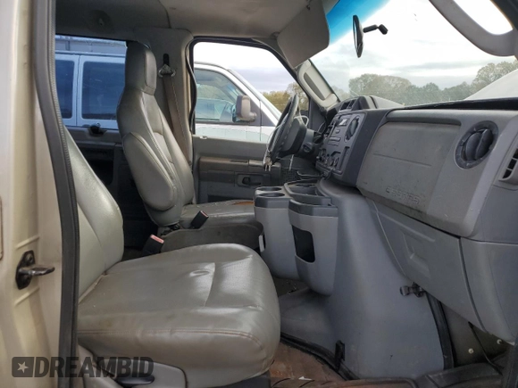 2010 Ford Econoline Passenger XL with VIN 1FMNE1BWXADA30935, listed as a Copart auction lot 77912734 with 153,775 mi miles and Salvage Title. Bid and sale history available at DreamBid. Image 7.
