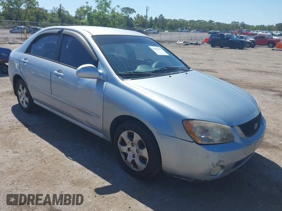 2005 Kia Spectra LX with VIN KNAFE121955107403, listed as a IAAI auction lot 42055036 with 157,605 mi miles. Bid and sale history available at carsss.com. Image 1.