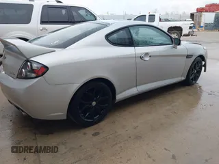 2008 Hyundai Tiburon GT z VIN KMHHN66F18U268929, wystawiony jako IAAI lot #42107550 z przebiegiem 142 547 mil mil oraz . Historia ofert i sprzedaży dostępna na DreamBid. Obrazek 4.