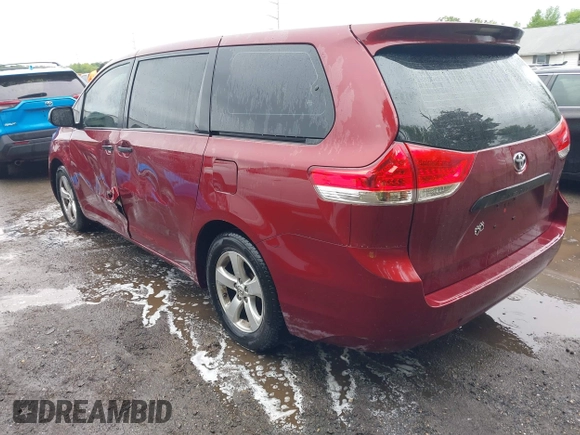 2014 Toyota Sienna L with VIN 5TDZK3DC0ES457242, listed as a IAAI auction lot 42307360 with 86,857 mi miles and . Bid and sale history available at DreamBid. Image 3.