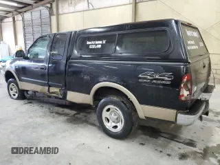 1999 Ford F-150 XL with VIN 1FTRX18L4XNB84248, listed as a Copart auction lot 52798555 with 204,943 mi miles and Salvage title. Bid and sale history available at DreamBid. Image 2.