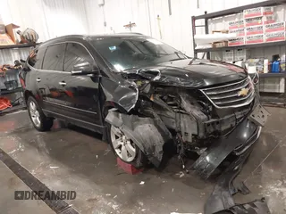 2015 Chevrolet Traverse LTZ z VIN 1GNKRJKD5FJ287835, wystawiony jako IAAI lot #42214046 z przebiegiem 102 904 mil mil oraz . Historia ofert i sprzedaży dostępna na DreamBid. Obrazek 1.