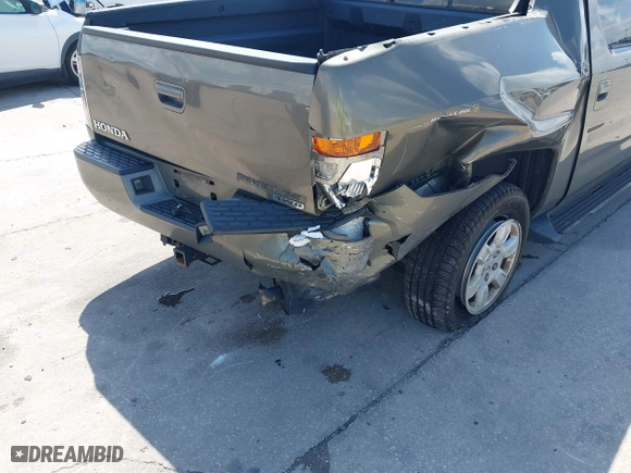 2007 Honda Ridgeline RTL w/Leather with VIN 2HJYK16527H547522, listed as a IAAI auction lot 41939603 with 127,899 mi miles. Bid and sale history available at carsss.com. Image 6.