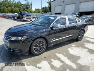2014 Chevrolet Impala LTZ with VIN 2G1155S33E9100836, listed as a Copart auction lot 61579135 with 142,576 mi miles and Salvage title. Bid and sale history available at DreamBid. Image 1.