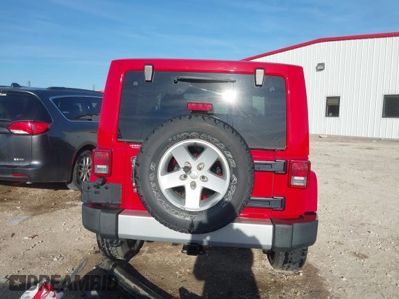 2011 Jeep Wrangler Sahara with VIN 1J4AA5D18BL561687, listed as a IAAI auction lot 41435436 with 76,284 mi miles and . Bid and sale history available at DreamBid. Image 17.