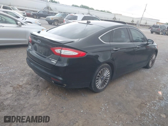 2016 Ford Fusion Titanium with VIN 3FA6P0K97GR118922, listed as a IAAI auction lot 42121212 with 256,584 mi miles and . Bid and sale history available at DreamBid. Image 4.
