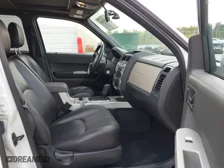 2008 Mercury Mariner Premier with VIN 4M2CU87118KJ11472, listed as a IAAI auction lot 42063566 with 128,274 mi miles. Bid and sale history available at carsss.com. Image 5.