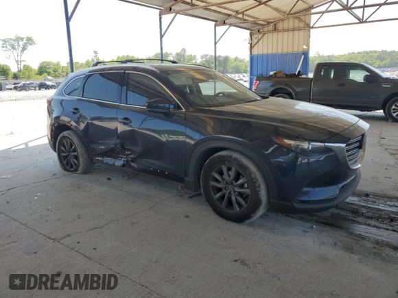 2021 Mazda CX-9 Touring with VIN JM3TCACY7M0528188, listed as a Copart auction lot 53880865 with 63,581 mi miles and Salvage title. Bid and sale history available at DreamBid. Image 4.