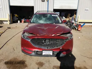 2020 Mazda CX-5 Grand Touring with VIN JM3KFBDM9L1820907, listed as a Copart auction lot 86166054 with 34,007 mi miles and Salvage Title. Bid and sale history available at carsss.com. Image 5.