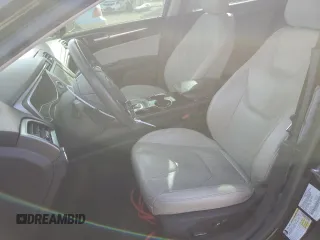 2016 Ford Fusion Titanium with VIN 3FA6P0K98GR319289, listed as a Copart auction lot 77114294 with 123,586 mi miles and Salvage Title. Bid and sale history available at DreamBid. Image 7.