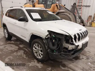 2014 Jeep Cherokee Latitude with VIN 1C4PJMCS4EW318353, listed as a IAAI auction lot 41945598 with 179,425 mi miles and . Bid and sale history available at DreamBid. Image 1.