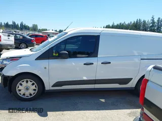 2018 Ford Transit Connect XLT z VIN NM0LS7F71J1372251, wystawiony jako IAAI lot #42630651 z przebiegiem 75 072 mil mil oraz . Historia ofert i sprzedaży dostępna na DreamBid. Obrazek 15.