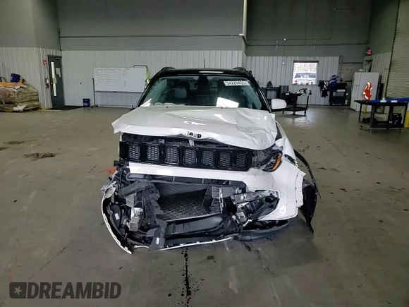 2018 Jeep Compass Latitude z VIN 3C4NJDBB6JT394374, wystawiony jako Copart lot #54229455 z przebiegiem 51 625 mil mil oraz Szkoda całkowita • Salvage title. Historia ofert i sprzedaży dostępna na DreamBid. Obrazek 14.