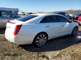 2013 Cadillac XTS Platinum z VIN 2G61V5S33D9235209, wystawiony jako Copart lot #46158375 z przebiegiem 178 848 mil mil oraz Szkody całkowita. Historia ofert i sprzedaży dostępna na DreamBid. Obrazek 3.