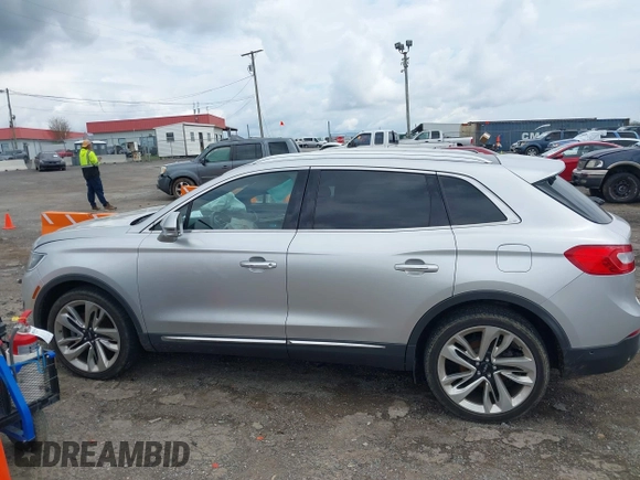 2016 Lincoln MKX Reserve with VIN 2LMPJ8LP8GBL84279, listed as a IAAI auction lot 41900294 with 70,958 mi miles. Bid and sale history available at carsss.com. Image 14.
