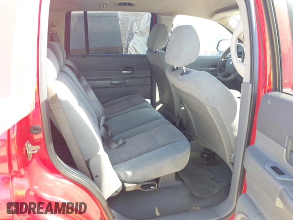 2005 Dodge Durango SLT z VIN 1D4HD48D75F621636, wystawiony jako IAAI lot #41786036 z przebiegiem 220 395 mil mil oraz . Historia ofert i sprzedaży dostępna na DreamBid. Obrazek 8.