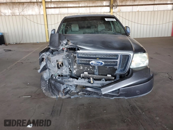 2005 Ford F-150 STX with VIN 1FTRX12W25NA37703, listed as a Copart auction lot 60089325 with 128,651 mi miles and Salvage title. Bid and sale history available at DreamBid. Image 5.