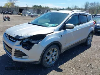 2016 Ford Escape Titanium with VIN 1FMCU9JX6GUB80715, listed as a IAAI auction lot 42060305 with 132,951 mi miles and . Bid and sale history available at DreamBid. Image 17.