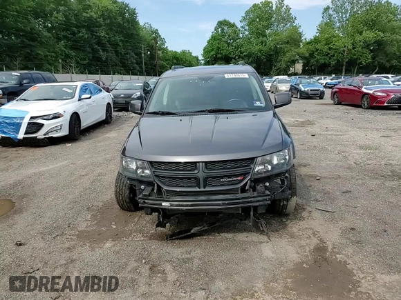 2015 Dodge Journey Crossroad with VIN 3C4PDDGG7FT676017, listed as a Copart auction lot 61740615 with 111,267 mi miles and Salvage title. Bid and sale history available at DreamBid. Image 14.