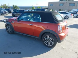 2012 MINI Convertible with VIN WMWZN3C54CT134124, listed as a IAAI auction lot 42313148 with 119,963 mi miles and . Bid and sale history available at DreamBid. Image 3.