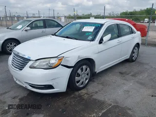 2014 Chrysler 200 LX with VIN 1C3CCBAB4EN141555, listed as a IAAI auction lot 41903899 with 242,673 mi miles. Bid and sale history available at carsss.com. Image 6.