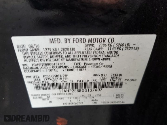 2016 Ford Taurus SEL with VIN 1FAHP2E88GG137607, listed as a Copart auction lot 61356505 with 33,768 mi miles and Salvage title. Bid and sale history available at DreamBid. Image 13.