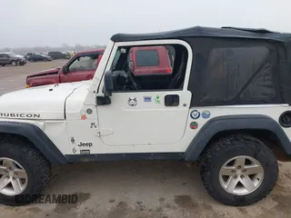 2006 Jeep Wrangler Rubicon with VIN 1J4FA69S16P710601, listed as a IAAI auction lot 41475818 with Not provided miles and . Bid and sale history available at DreamBid. Image 14.
