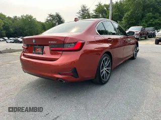 2022 BMW 3 Series 330i with VIN 3MW5R1J04N8C24737, listed as a Copart auction lot 60651665 with 59,638 mi miles and Clean title. Bid and sale history available at DreamBid. Image 3.