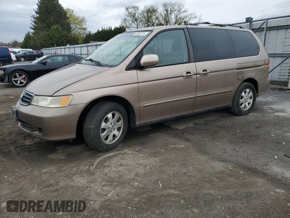 2003 Honda Odyssey EX-L z VIN 5FNRL18053B103431, wystawiony jako Copart lot #52580715 z przebiegiem Nie podano mil oraz Szkoda całkowita • Salvage title. Historia ofert i sprzedaży dostępna na DreamBid. Obrazek 1.