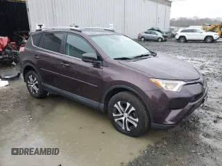 2018 Toyota RAV4 LE with VIN 2T3BFREV6JW737751, listed as a Copart auction lot 49123855 with 92,642 mi miles and Salvage Title. Bid and sale history available at DreamBid. Image 4.
