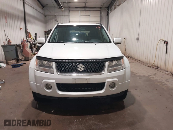 2006 Suzuki Grand Vitara Premium with VIN JS3TD943664100584, listed as a IAAI auction lot 41453129 with 159,220 mi miles and . Bid and sale history available at DreamBid. Image 12.