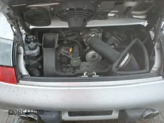 2003 Porsche 911 z VIN WP0AA29983S620988, wystawiony jako Copart lot #49378715 z przebiegiem 99 291 mil mil oraz Szkoda całkowita • Salvage title. Historia ofert i sprzedaży dostępna na DreamBid. Obrazek 11.