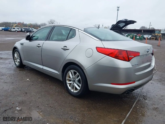 2011 Kia Optima LX with VIN KNAGM4A76B5146718, listed as a IAAI auction lot 42006225 with 213,939 mi miles. Bid and sale history available at carsss.com. Image 3.