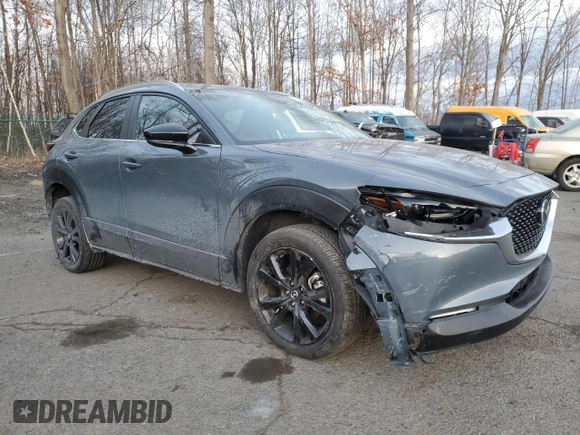 2023 Mazda CX-30 S Carbon Edition с VIN 3MVDMBCM3PM500403, выставлен на аукционе Copart как лот 88146095 с пробегом 29 861 миль миль и Списание • Salvage title. История ставок и продаж доступна на DreamBid. Изображение 4.