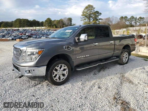 2016 Nissan Titan SL z VIN 1N6BA1F29GN515240, wystawiony jako Copart lot #45185835 z przebiegiem 137 164 mil mil oraz Czysty tytuł • Clean title. Historia ofert i sprzedaży dostępna na DreamBid. Obrazek 1.