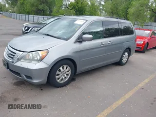 2009 Honda Odyssey EX-L with VIN 5FNRL38629B033203, listed as a IAAI auction lot 42172416 with 261,270 mi miles. Bid and sale history available at carsss.com. Image 2.