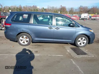 2014 Toyota Sienna L with VIN 5TDZK3DC0ES413970, listed as a IAAI auction lot 40870422 with 138,589 mi miles. Bid and sale history available at carsss.com. Image 13.