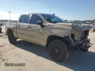 2022 Chevrolet Silverado 1500 LT Trail Boss with VIN 3GCUDFET0NG580297, listed as a Copart auction lot 80829184 with 64,717 mi miles and Salvage Title. Bid and sale history available at DreamBid. Image 4.
