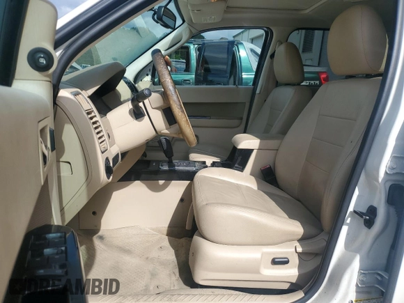 2011 Ford Escape Limited z VIN 1FMCU0EG2BKC70972, wystawiony jako Copart lot #58981605 z przebiegiem 120 117 mil mil oraz Szkoda całkowita • Salvage title. Historia ofert i sprzedaży dostępna na DreamBid. Obrazek 7.