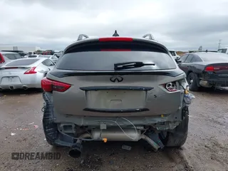 2014 Infiniti QX70 z VIN JN8CS1MU3EM451745, wystawiony jako IAAI lot #42203922 z przebiegiem 144 990 mil mil oraz . Historia ofert i sprzedaży dostępna na DreamBid. Obrazek 16.