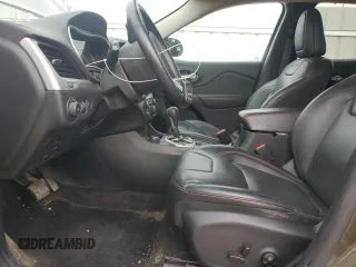 2015 Jeep Cherokee Trailhawk with VIN 1C4PJMBS0FW678738, listed as a Copart auction lot 50651235 with 147,793 mi miles and Salvage title. Bid and sale history available at DreamBid. Image 7.