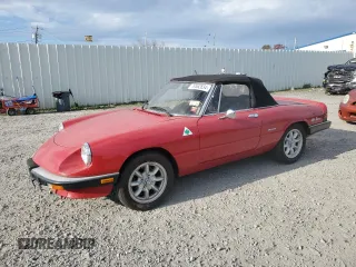1986 Alfa Romeo Spider Veloce z VIN ZARBA5412G1044422, wystawiony jako Copart lot #79562634 z przebiegiem 84 610 mil mil oraz Tytuł czysty. Historia ofert i sprzedaży dostępna na DreamBid. Obrazek 1.