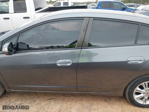 2011 Honda Insight EX with VIN JHMZE2H73BS002255, listed as a IAAI auction lot 41756002 with 145,289 mi miles. Bid and sale history available at carsss.com. Image 14.